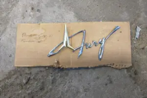 61 Plymouth Fury emblem